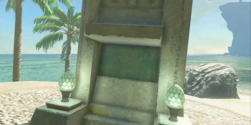 A stone tablet on a beach in Hyrule