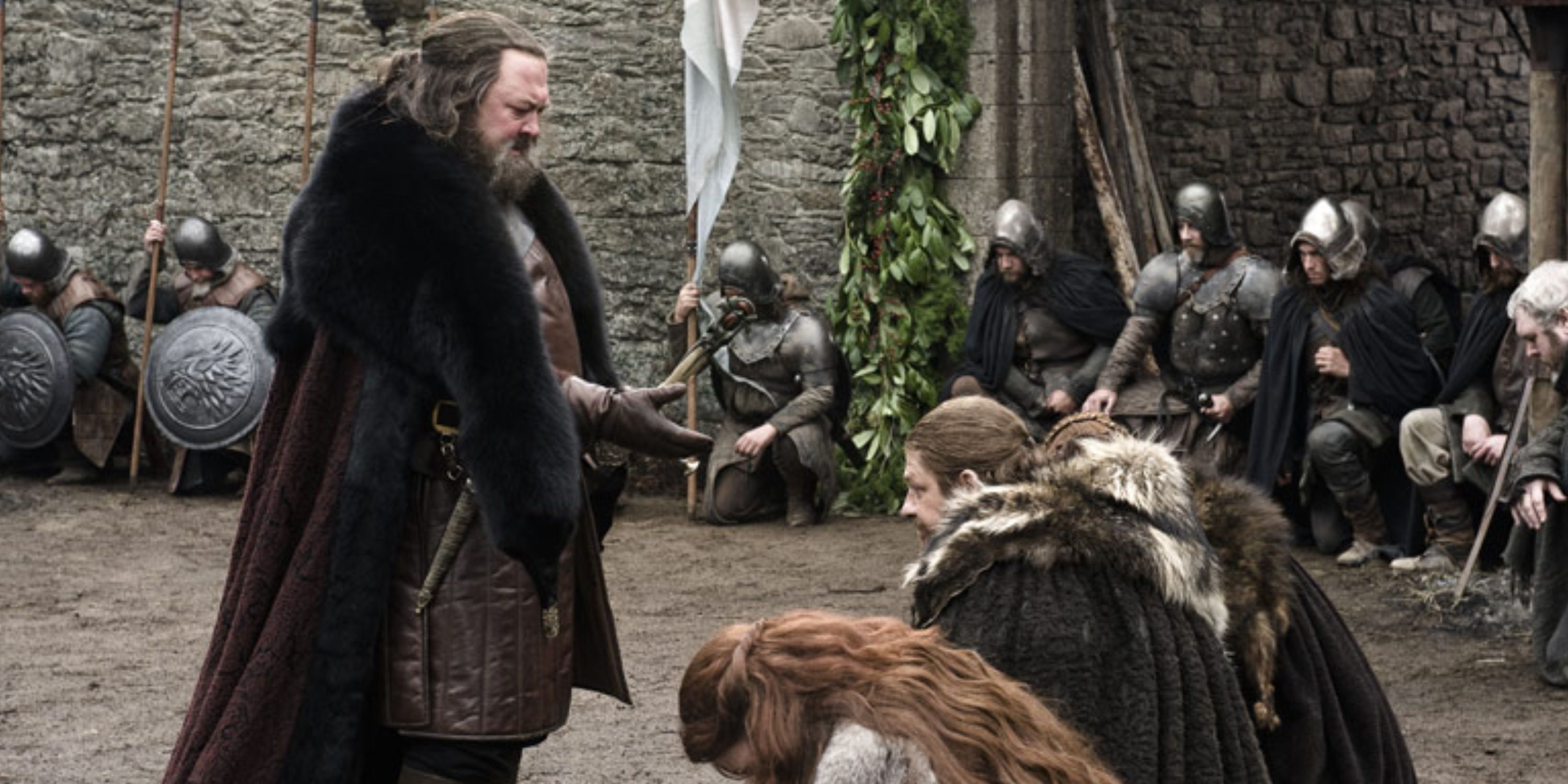 Robert Baratheon fait s'agenouiller les Starks