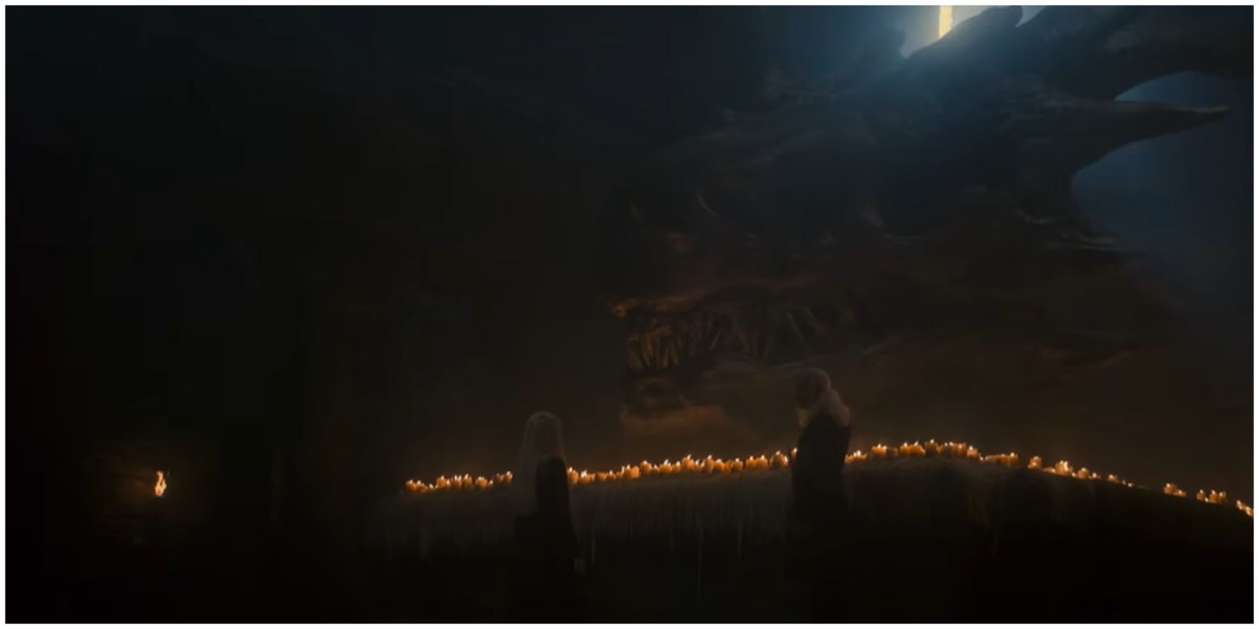 Viserys and Rhaenyra at Balerion's shrine in House of the Dragon.