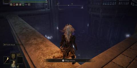 Pillaging a corpse in Elden Ring