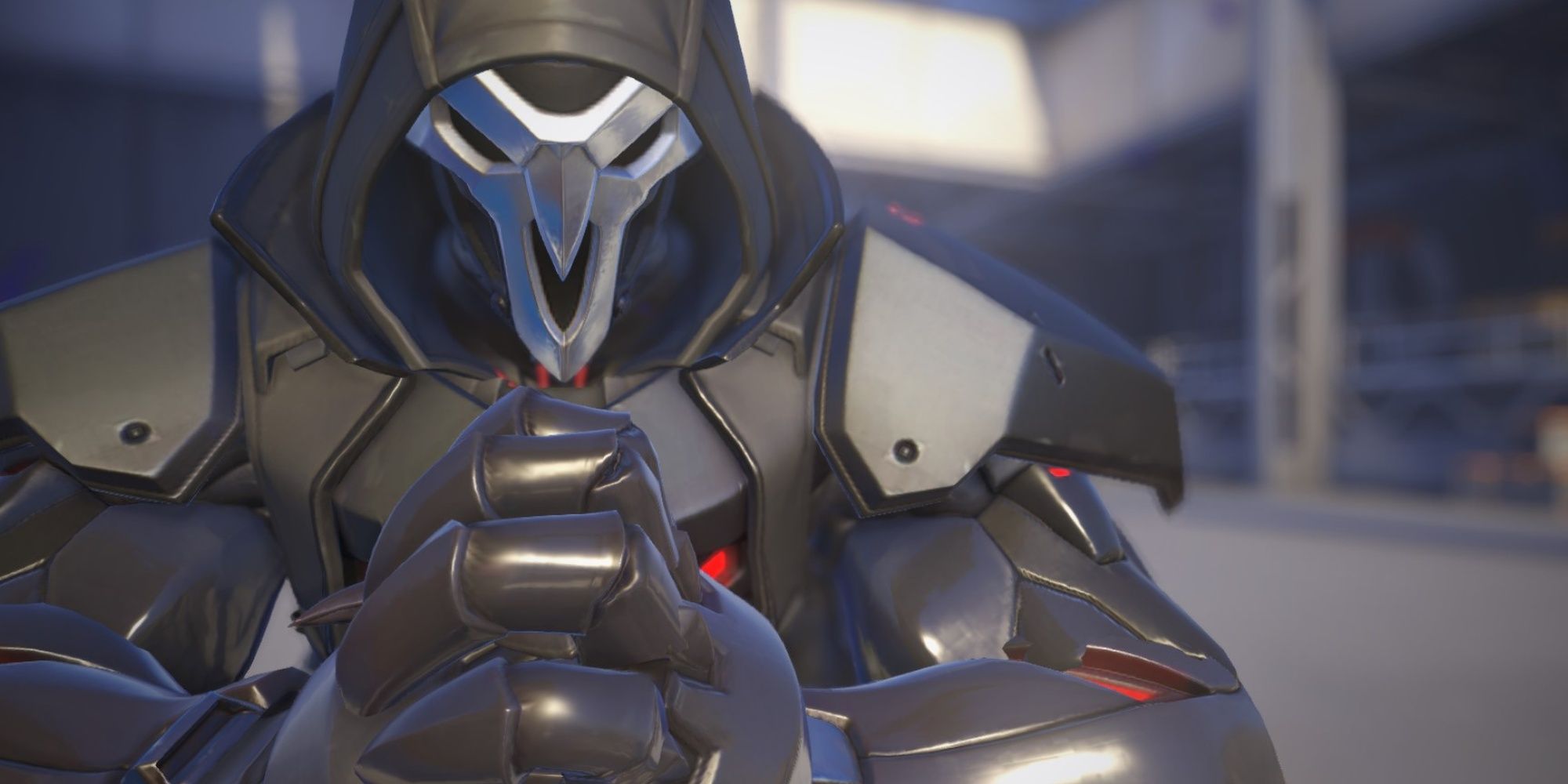 Reaper from Overwatch 2 cracks his knucles.