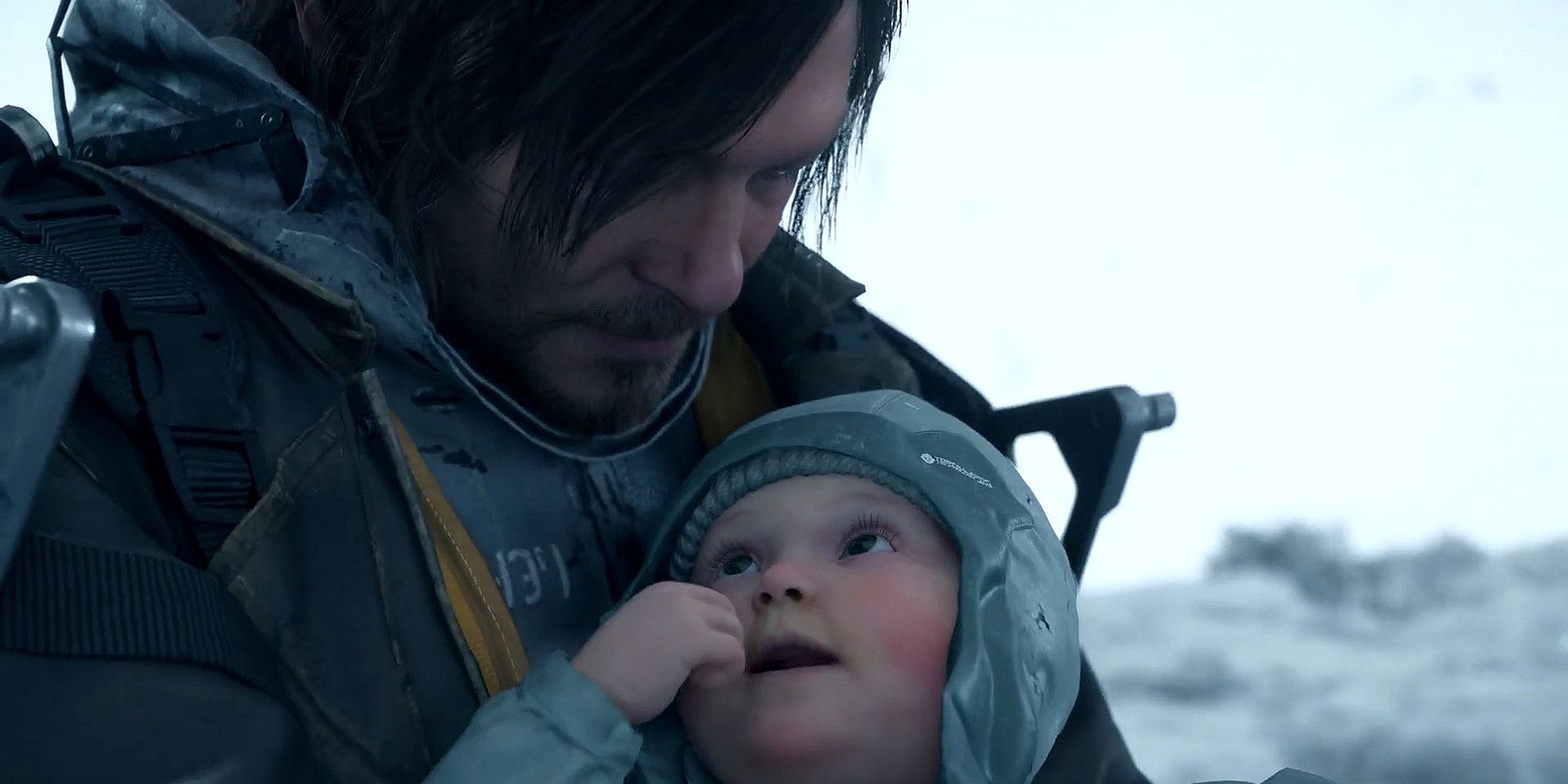 Sam holding a baby in Death Stranding 2