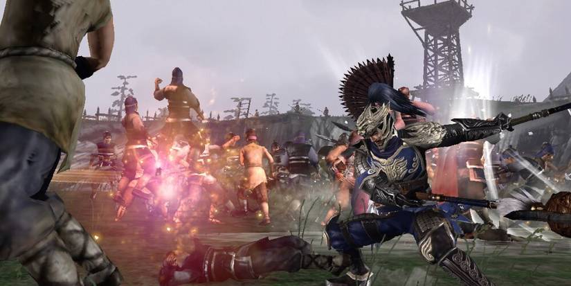 Li Bu slashing enemy soldiers on a battlefield 