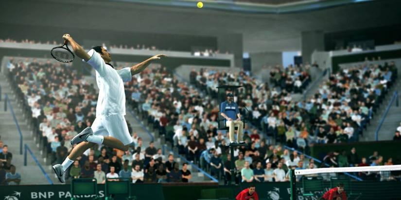 Roger Federer jumping up and hitting a high ball 