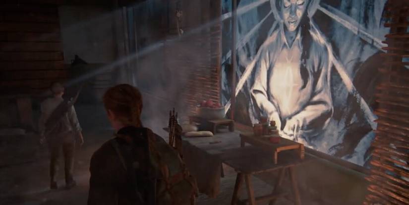 Abby and Lev looking at a shrine 