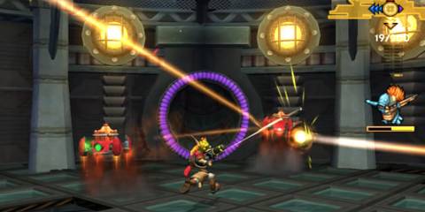 Jak firing a gun at multiple drones in an arena in Jak 3