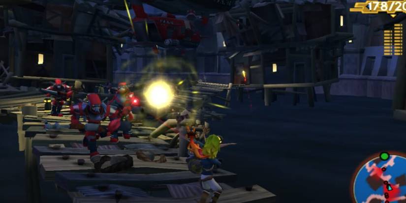 Jak shooting a horde of enemies on a wooden walkway 