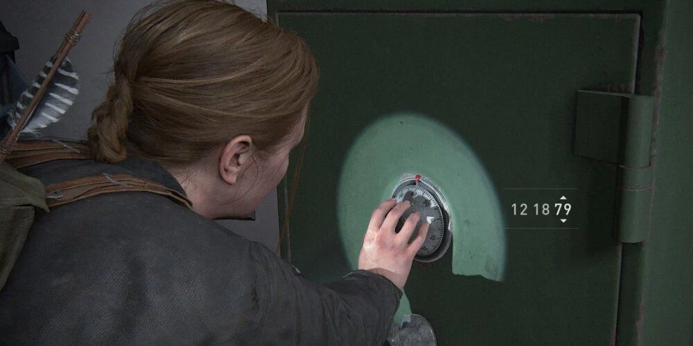 Abby unlocking a safe 