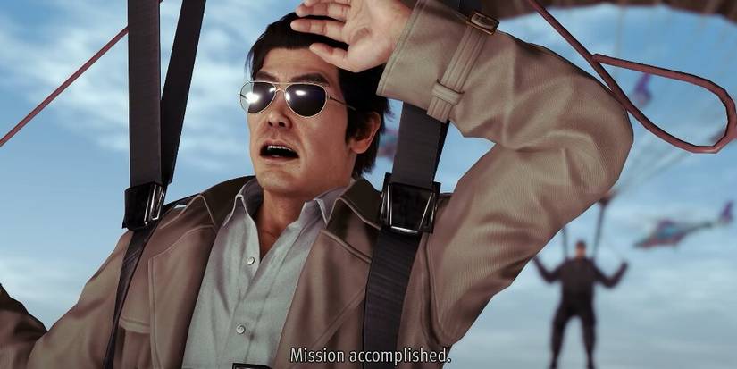 Makoto Date gliding with a glider saying "Mission Accomplished" 