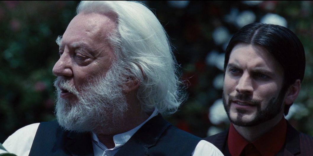 Seneca Crane with President Snow in The Hunger Games
