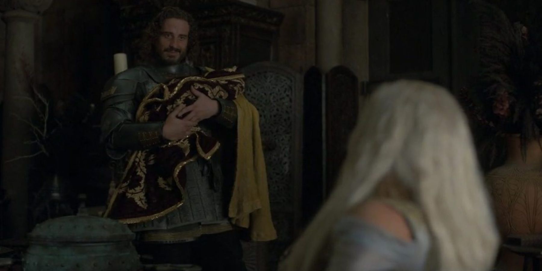 Ser Harwin Strong Holding A Baby