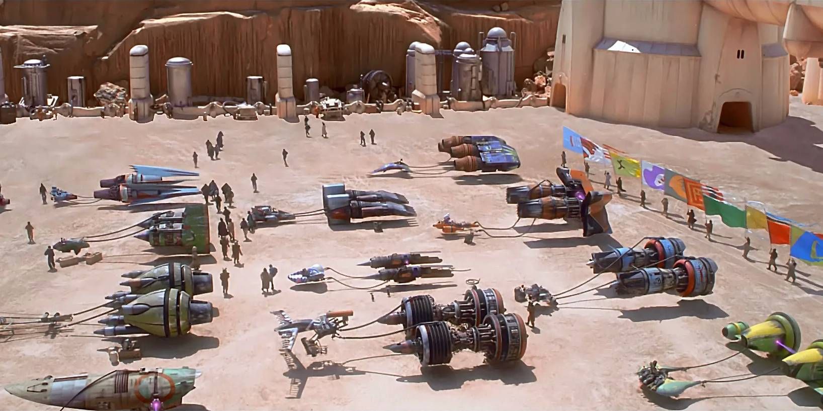 Podracers lined up at the race start in Star Wars: Episode I: The Phantom Menace