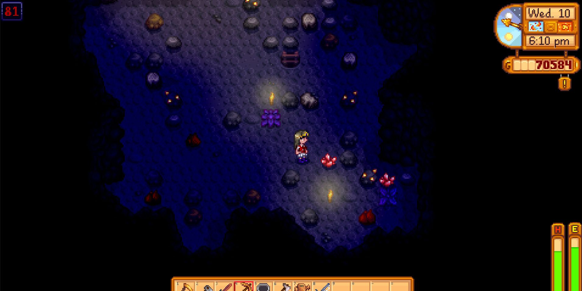 Image of a character foraging for Fire Quartz in Stardew Valley