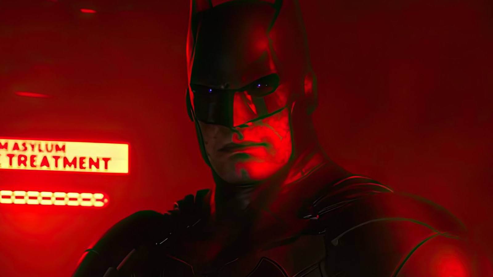 A screenshot of a brainwashed Batman covered in red light in Suicide Squad: Kill the Justice League.