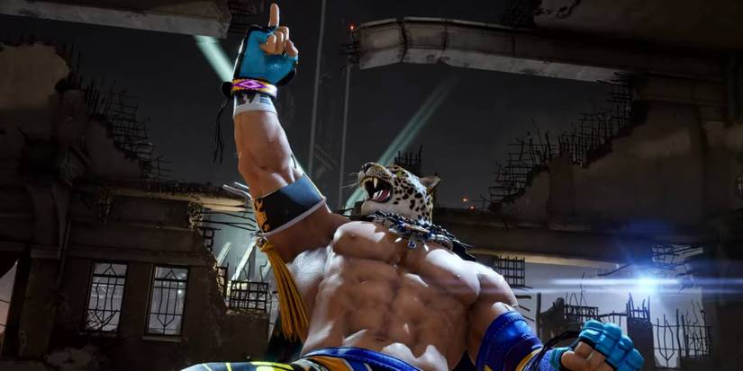 King posing outside of a wrecked building in Tekken 8