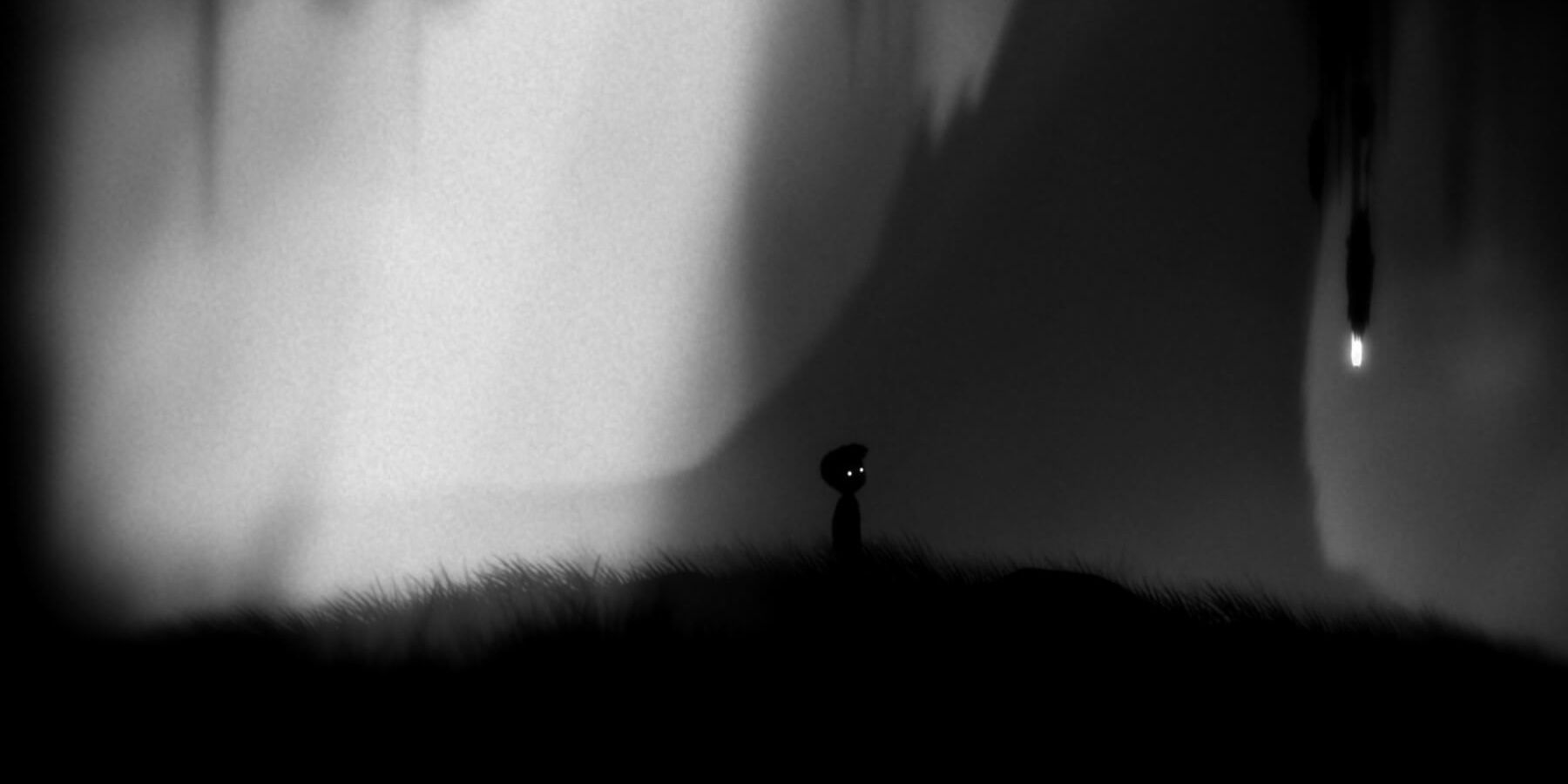 'the boy' in LIMBO in an open area looking at a glowing object