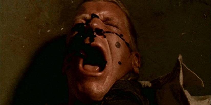 Black oil on a man's face in The X-Files