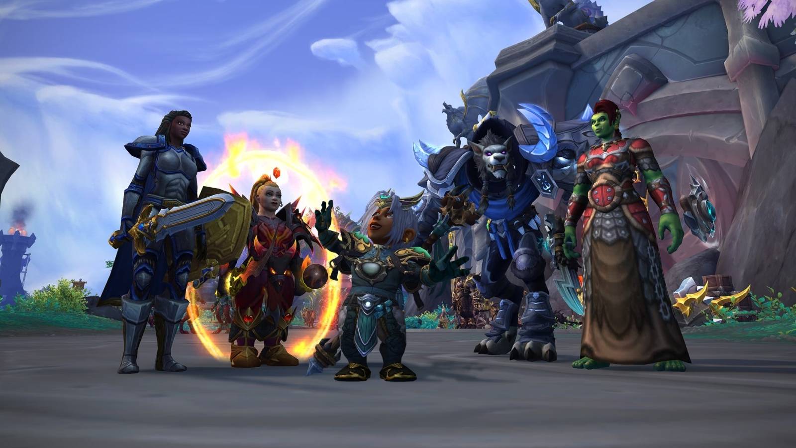 a human paladin, dwarf mage, gnome, worgen hunter, and orc shaman in wow