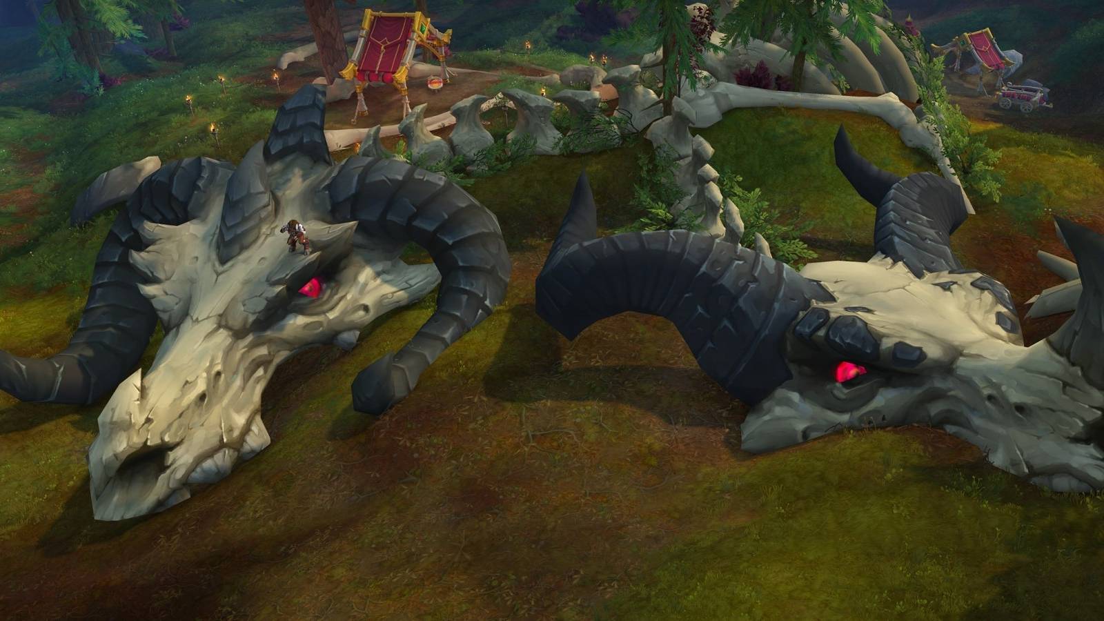 two massive dragon skeletons at a dig site in world of warcraft