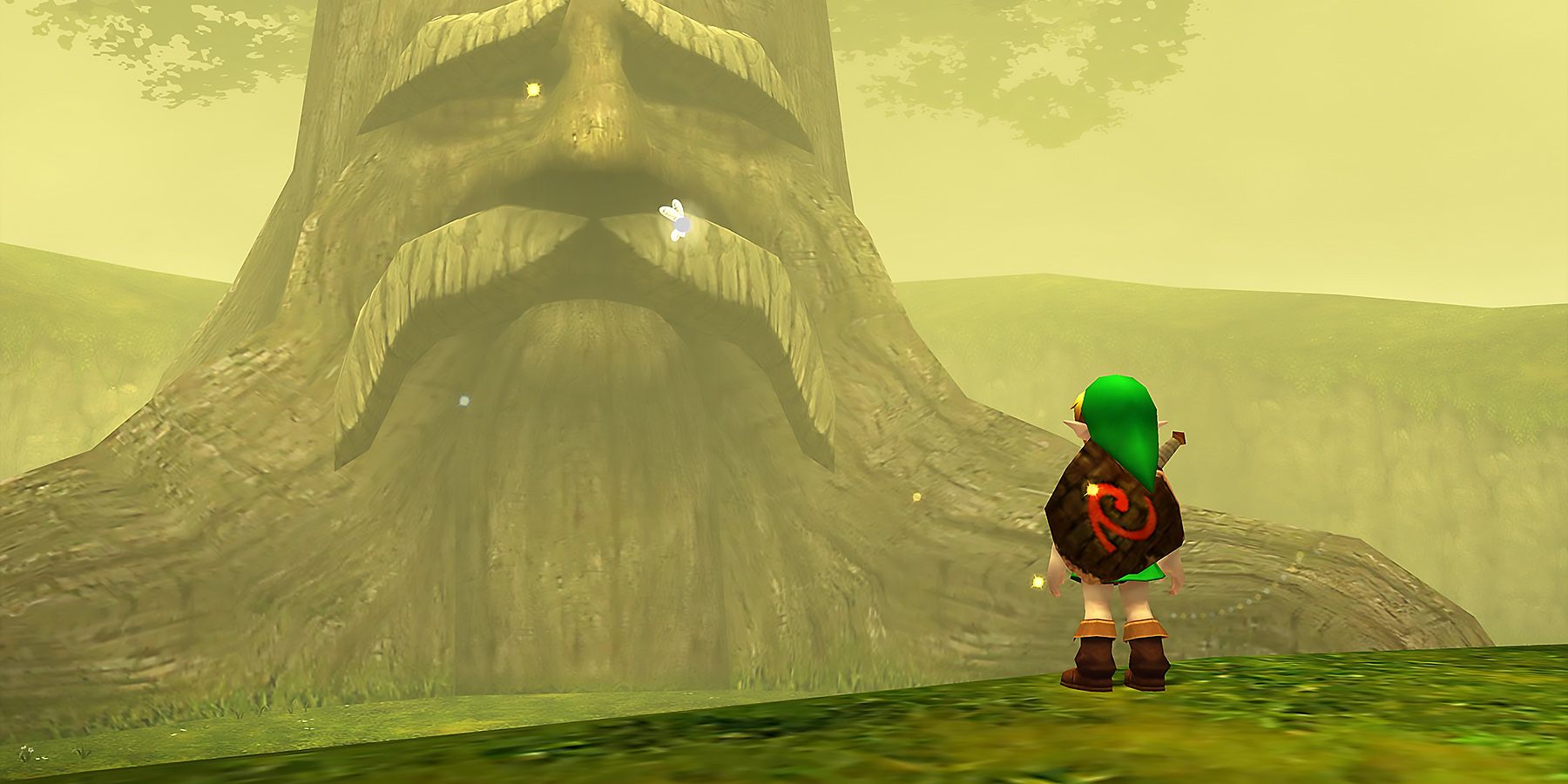 Young Link standing before the Deku Tree in Ocarina of Time
