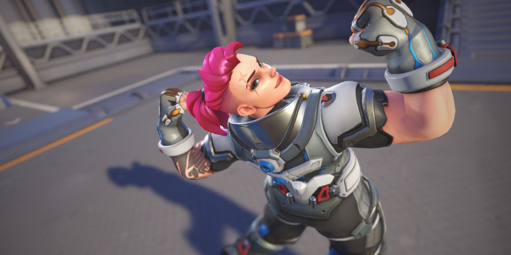 Zarya from Overwatch 2 Flexes with her back to the camera.