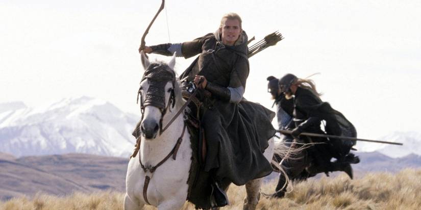 Legolas riding Arod and holding a bow