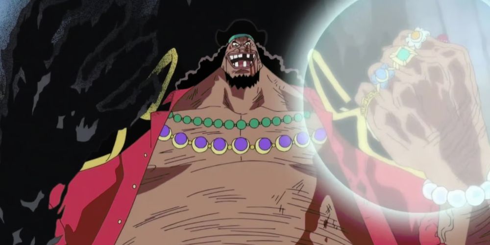 Blackbeard wielding the powers of his ⁣two Devil ‌Fruits.