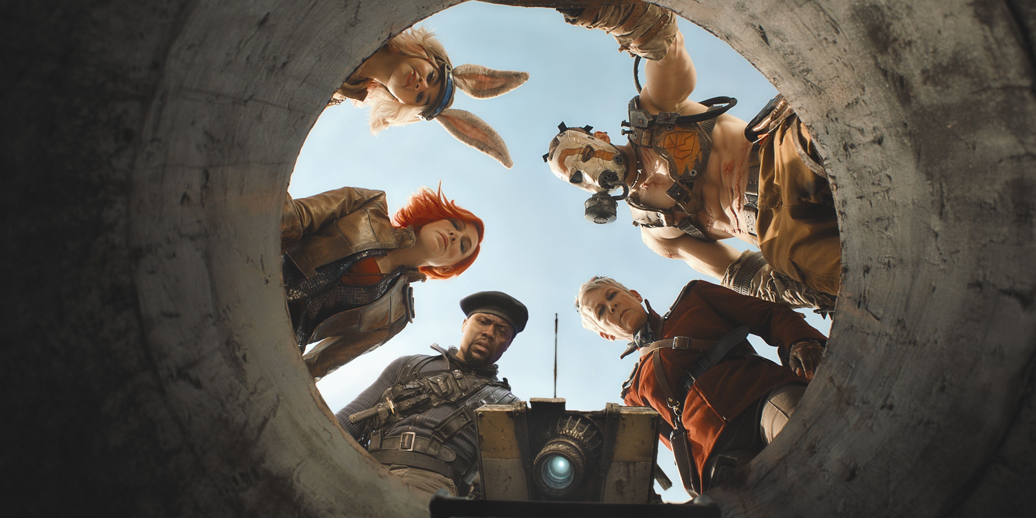 Cast of Borderlands movie looking in a hole in Borderlands 2024 Cropped
