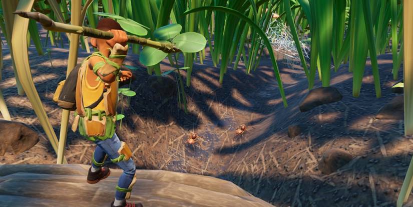 Character holds spear aloft in Grounded