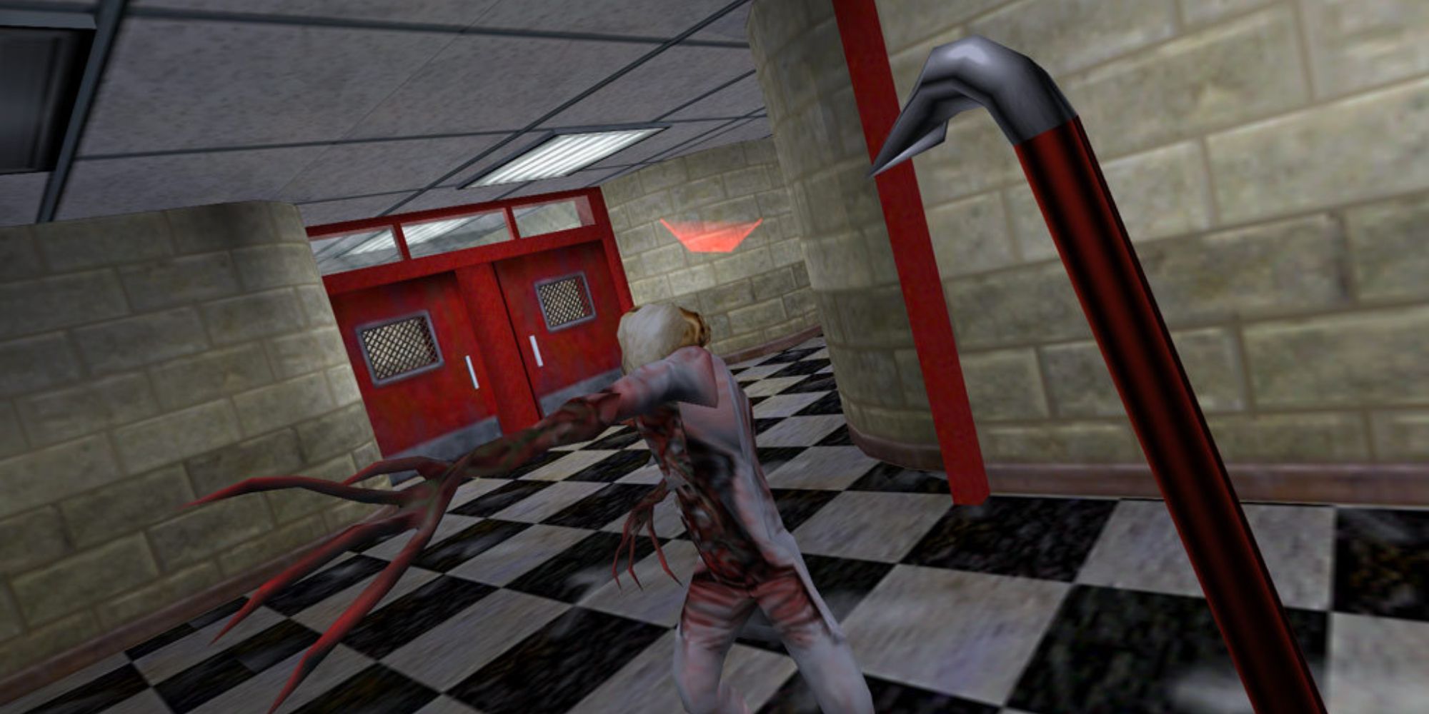 A creature attacking a player wielding a crowbar in a hallway in Half-Life