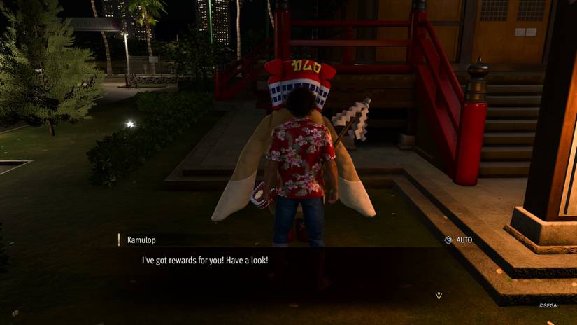 Speaking with Kamulop in Like a Dragon: Infinite Wealth.