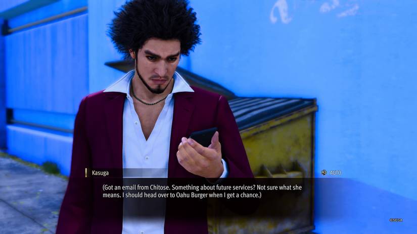 Kasuga receives a text message from Chitose Buster Holmes in Like a Dragon: Infinite Wealth