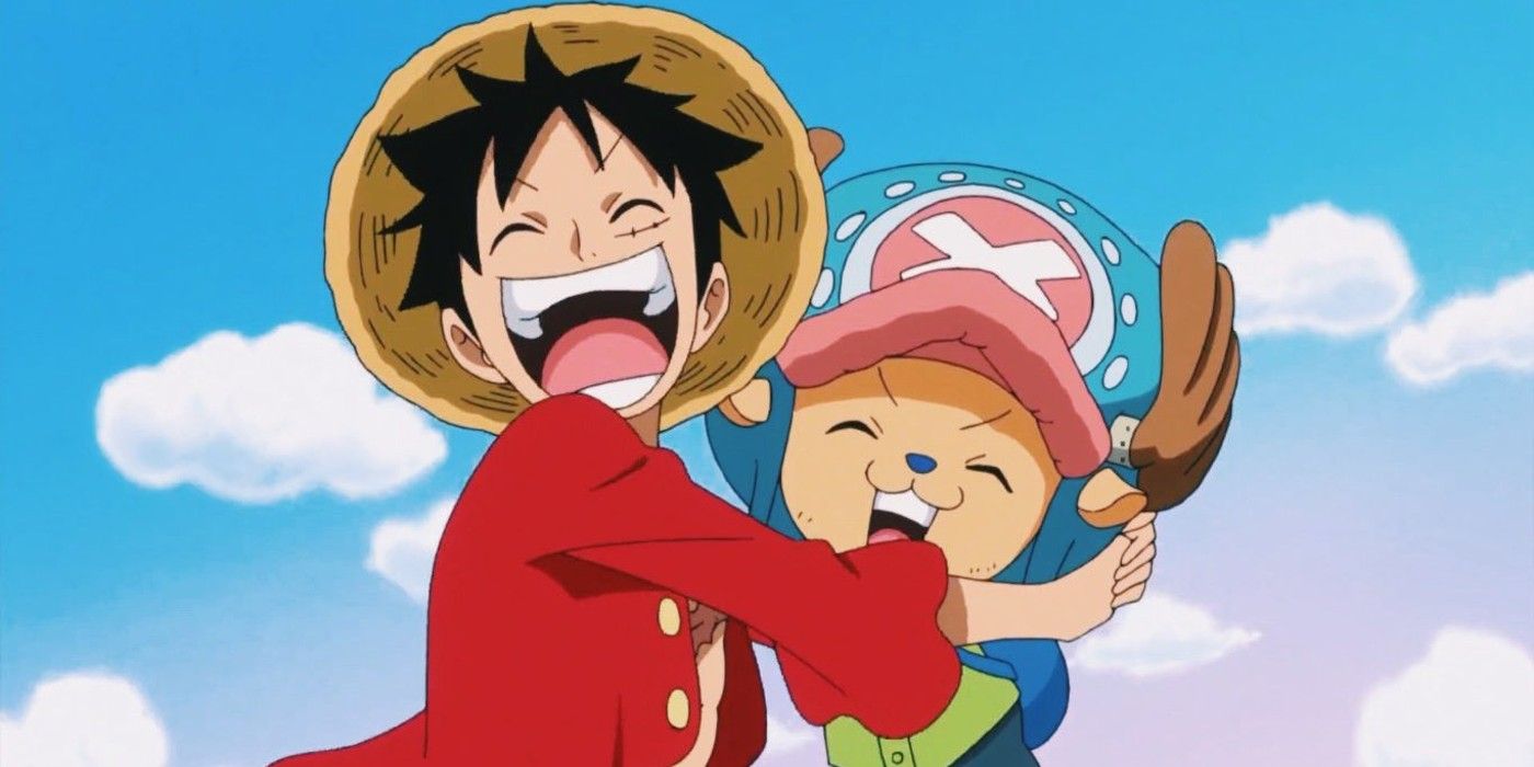 Luffy and Chopper hugging each other and laughing in One Piece