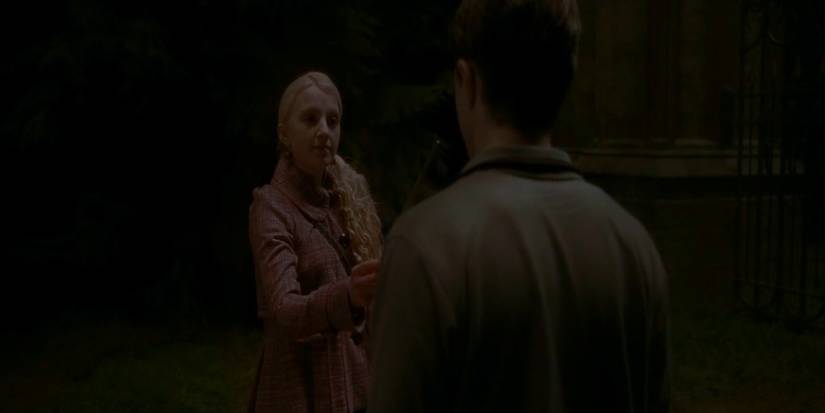 Luna fixing Harry's nose in Harry Potter