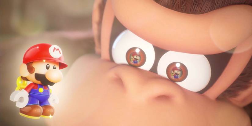 donkey kong glares at mini mario toy