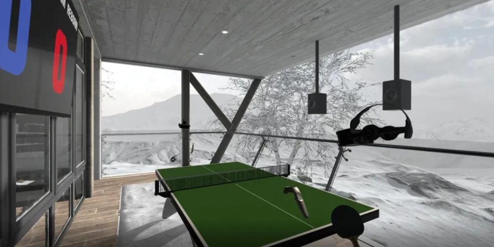 A pong pong table on a balcony in the snowy mountains