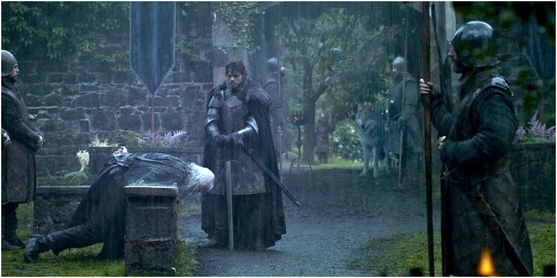 Robb Stark about to behead Rickard Karstark in Game of Thrones.