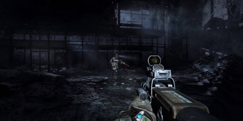 Aiming gun at friend