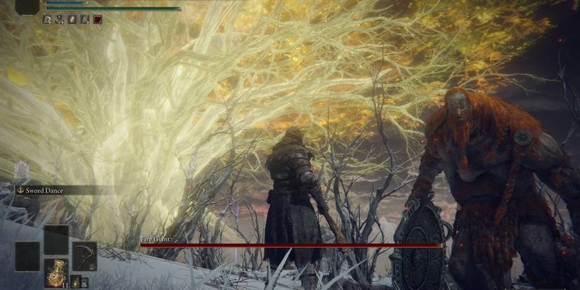 Fighting a Fire Giant in Elden Ring