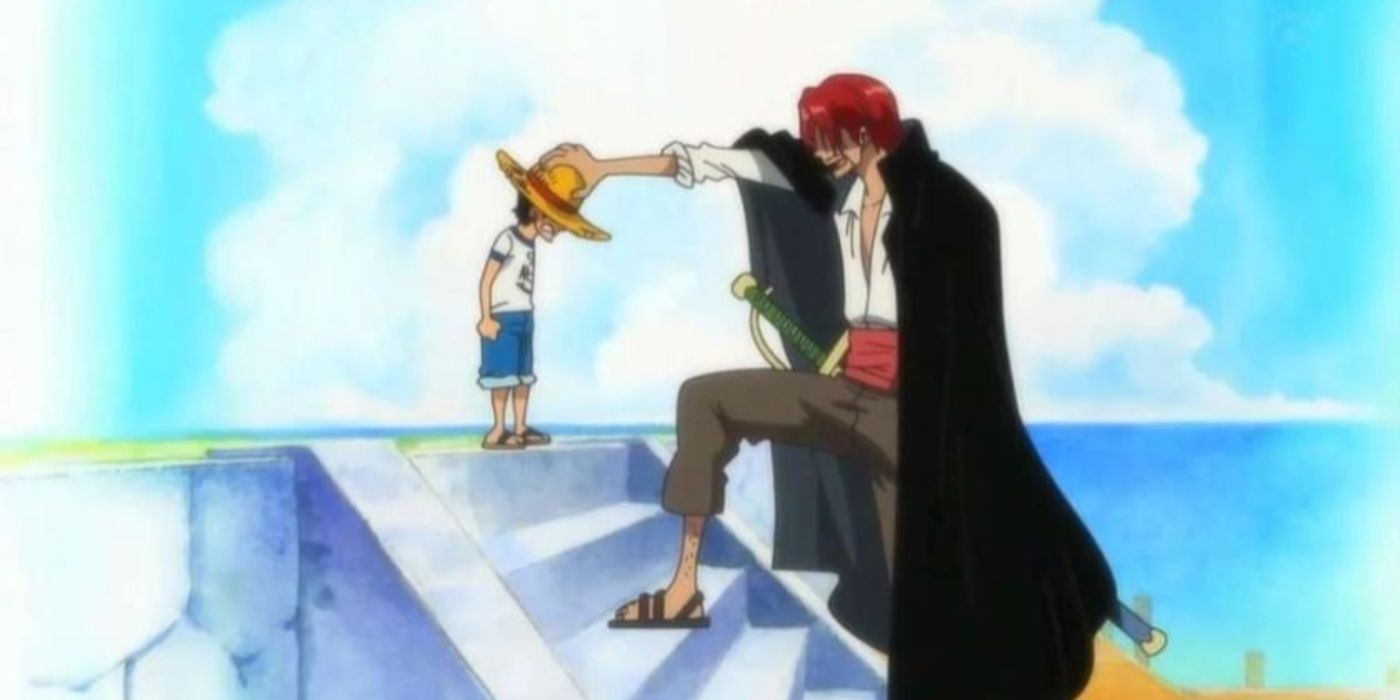Shanks gives Luffy his straw hat after saving his life in One Piece