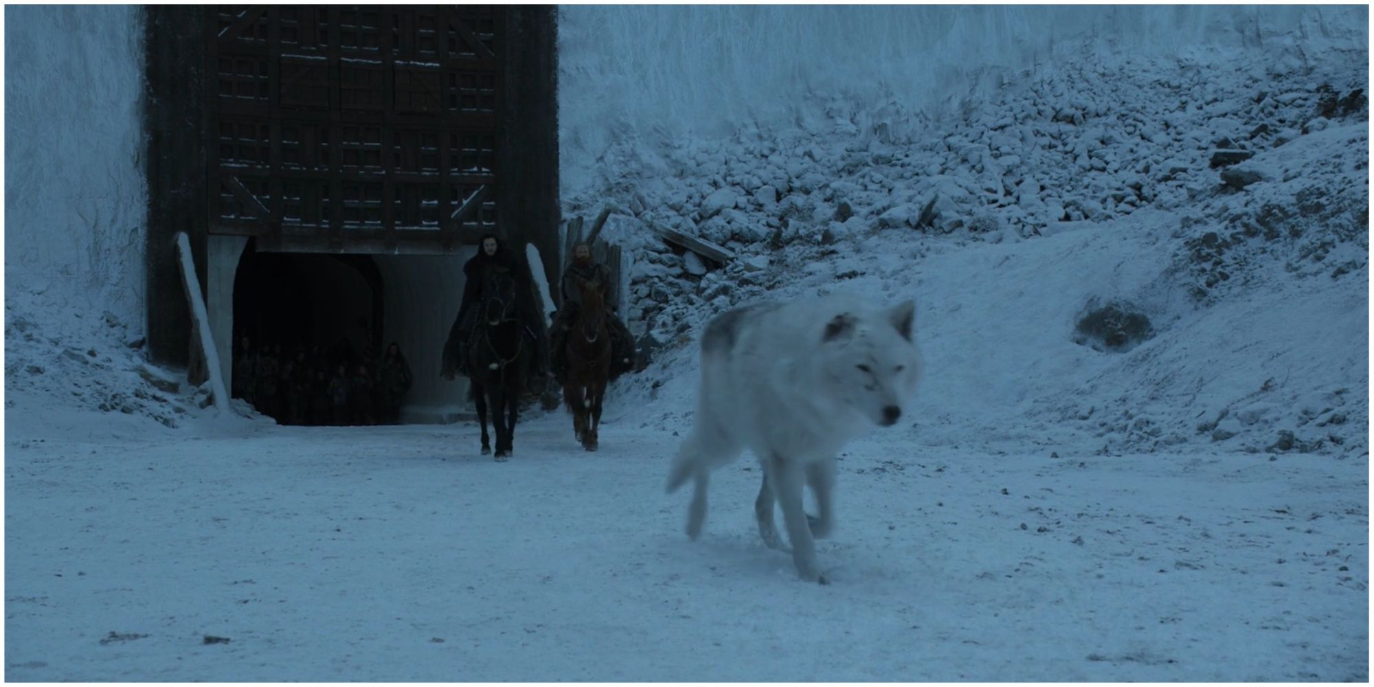 Jon Snow Tormund Giantsbane and Ghost leaving Castle Black in Game of Thrones.