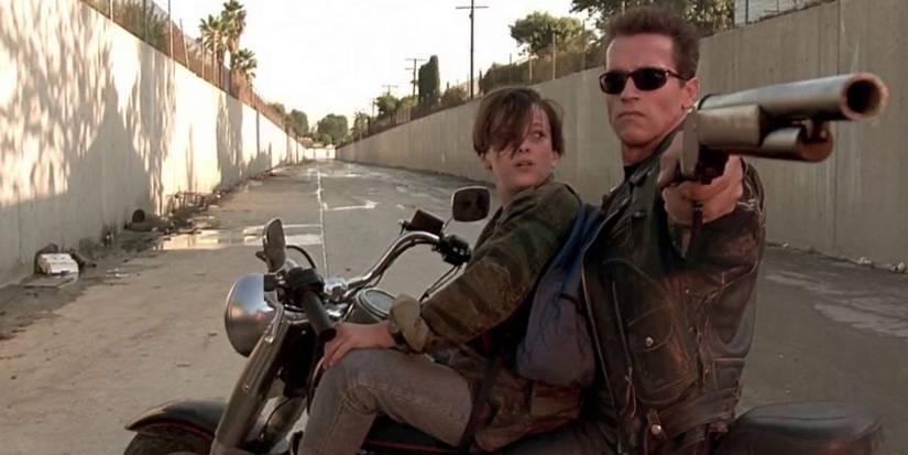 Aiming shotgun from bike