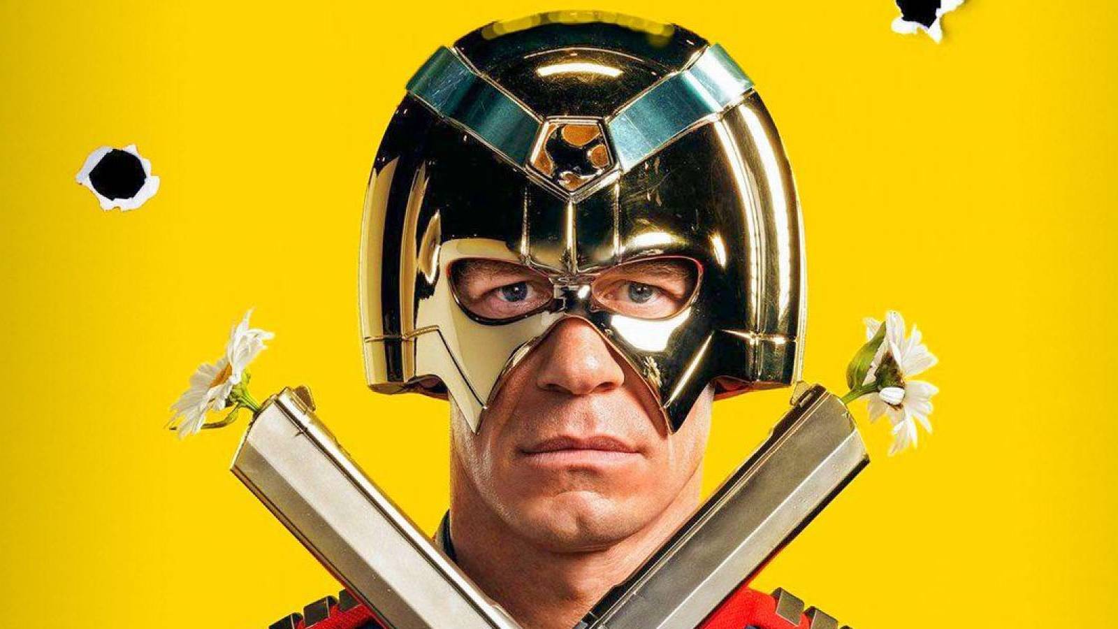 A promotional image of Peacemaker, as played by John Cena, holding his twin pistols against a yellow background.