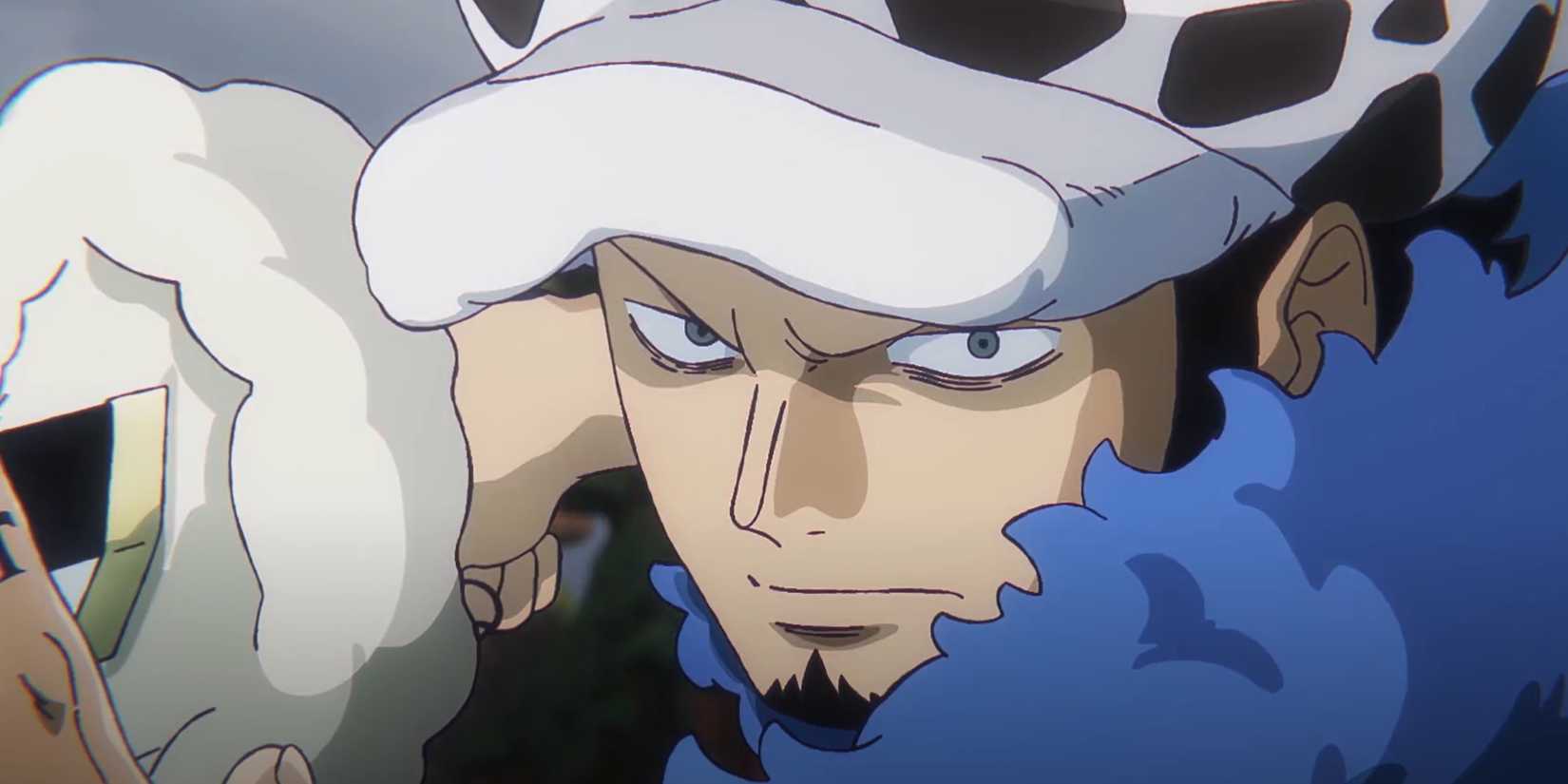 Trafalgar Law scowls as he fights.