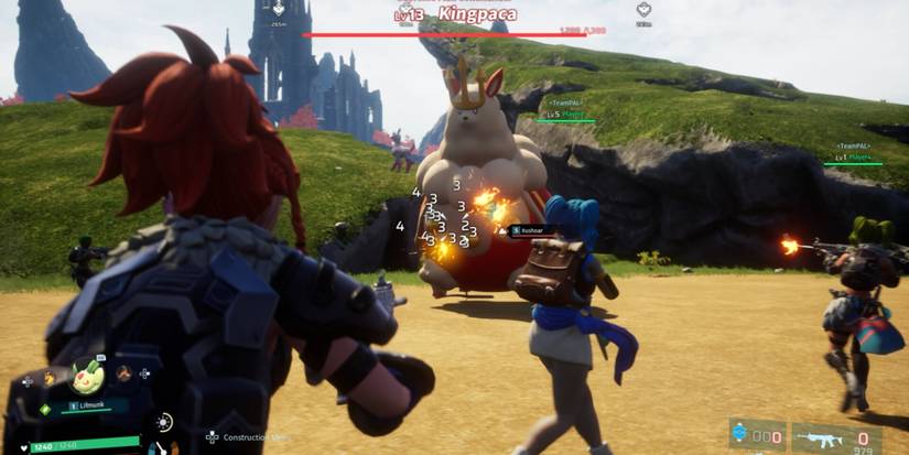 A Palworld battle screenshot featuring players and a Kingpaca.