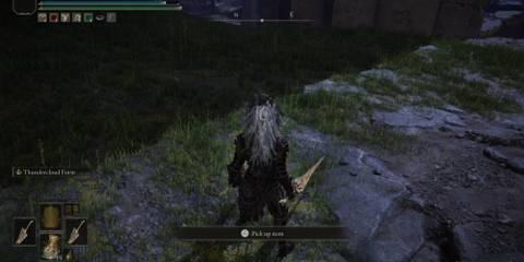 Picking up an item from a corpse in Elden Ring