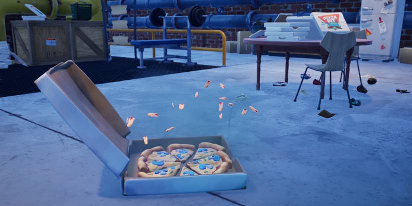 thrown pizza party item on the ground