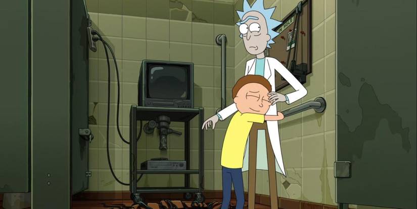 Rick And Morty hug outside of the Fear Hole with a televison in the background
