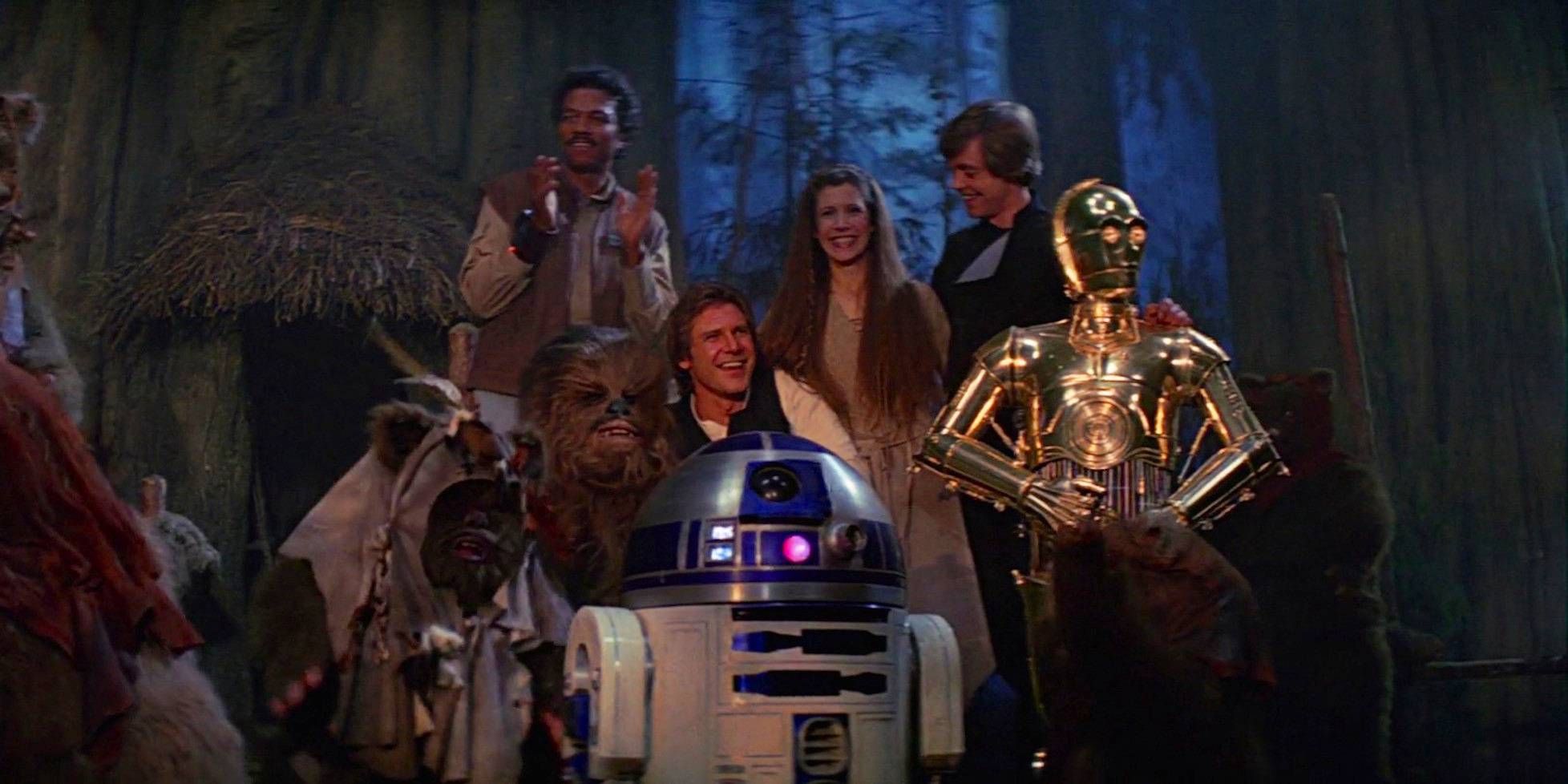 Final shot from Star Wars Return of the Jedi featuring Luke Skywalker, Leia Organa, Han Solo, Lando Calrissian, Chewbacca, R2-D2, and C-3PO