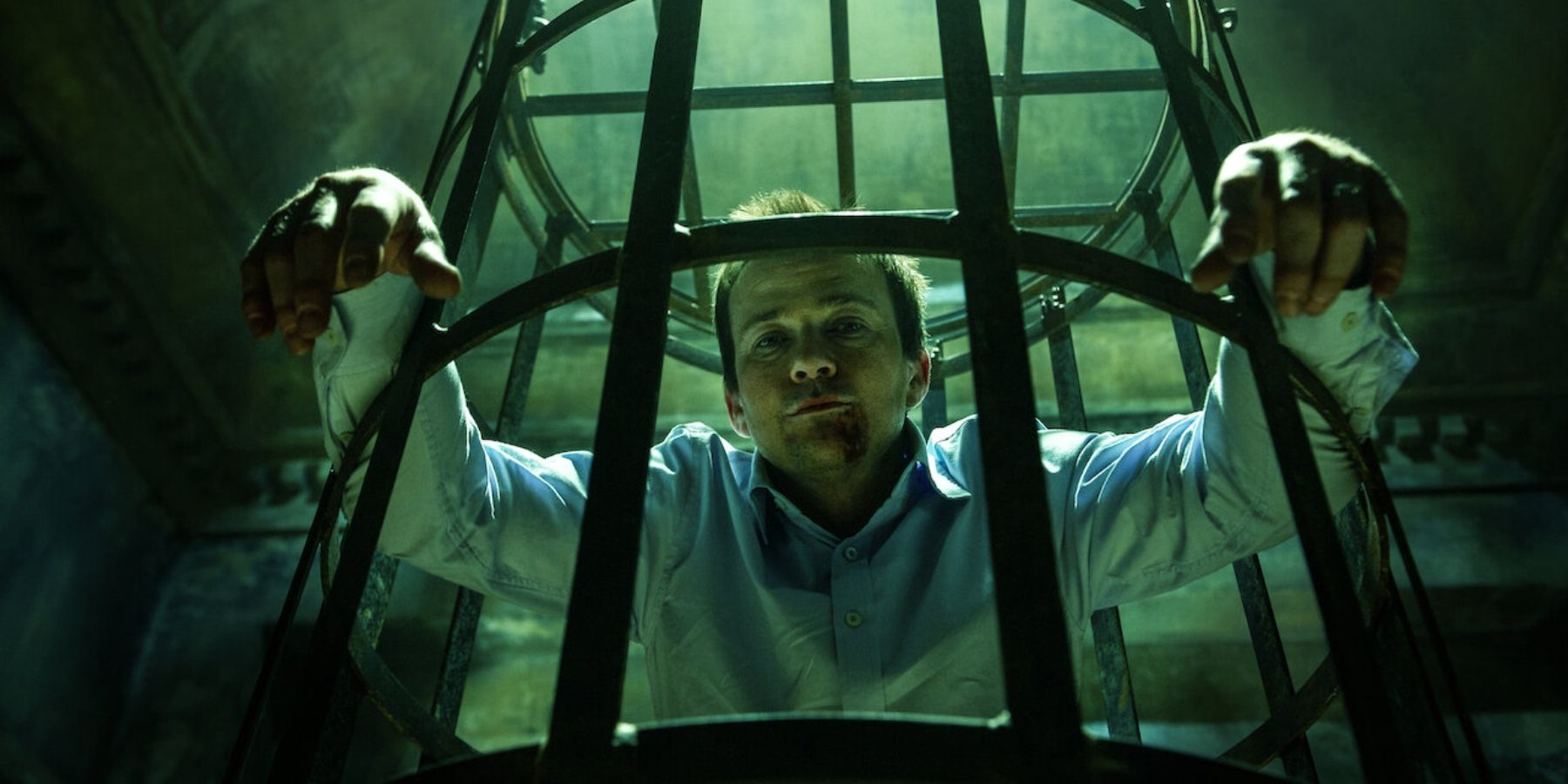 A character in a cage in Saw: The Final Chapter